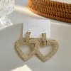 Golden heart-shaped diamond-encrusted earrings, fashionable and light luxury women's earrings, earrings, earrings, stud earrings, silver needle vintage accessories details Picture